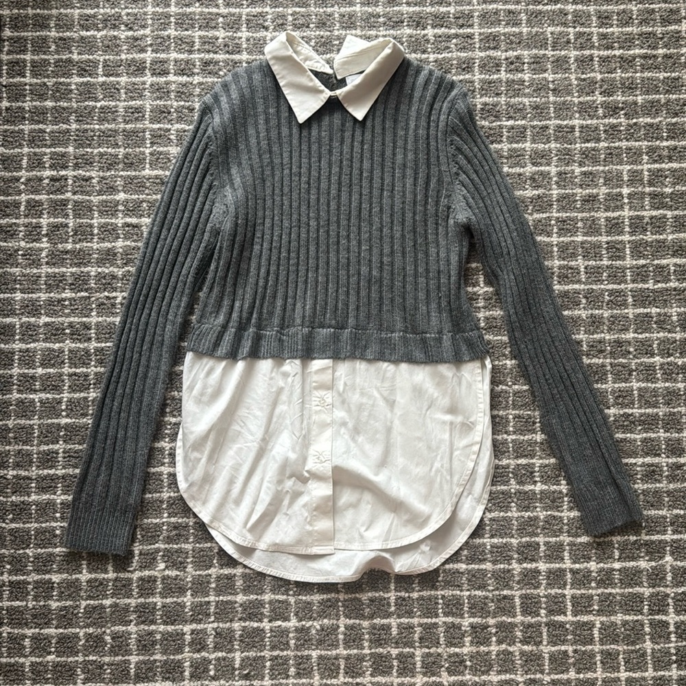 Trendy Sweater/shirt top. Kids, but would fit a petite woman with a small bust